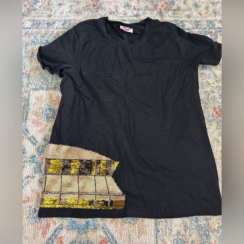 Sparkle city 
Saints dome wrap tee